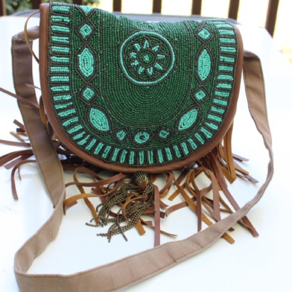 Earthbound fringe cross body bag Embroidered